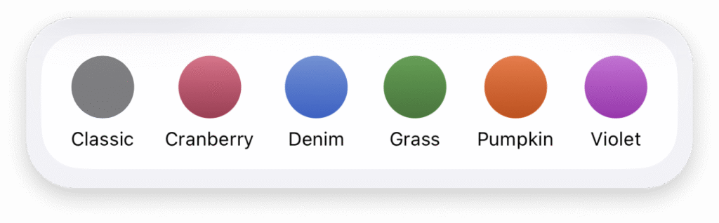 Round swatches of theme colors from left to right: Cranberry (red), Denim (blue), Grass (green), Pumpkin (Orange), Violet (purple).